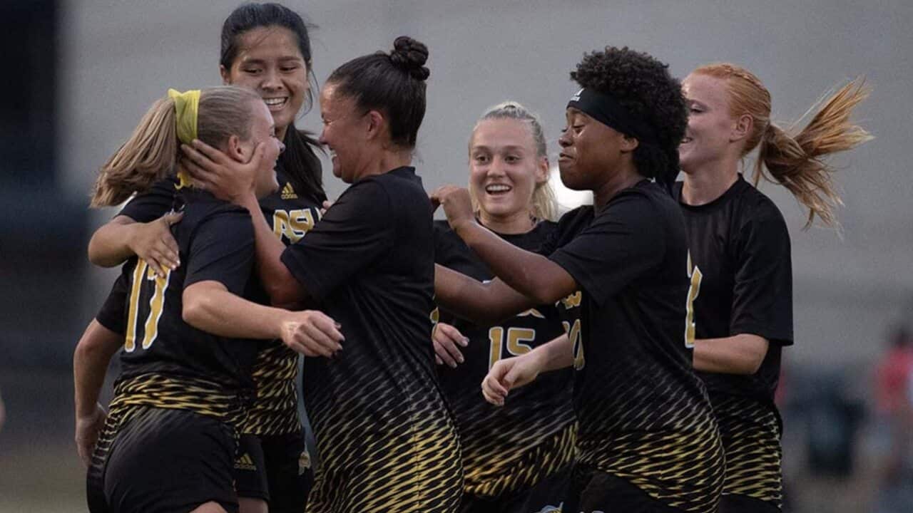 Alabama State University players celebrate a goal