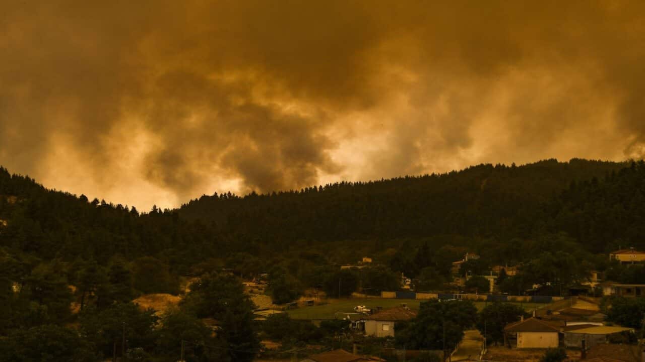 The fires surround the village of Peyki, on the island of Evia on the fifth day of a wildfire in the area, in Greece, 8 August 2021.