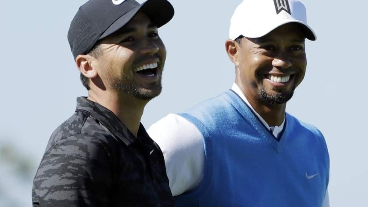 Jason Day and Tiger Woods
