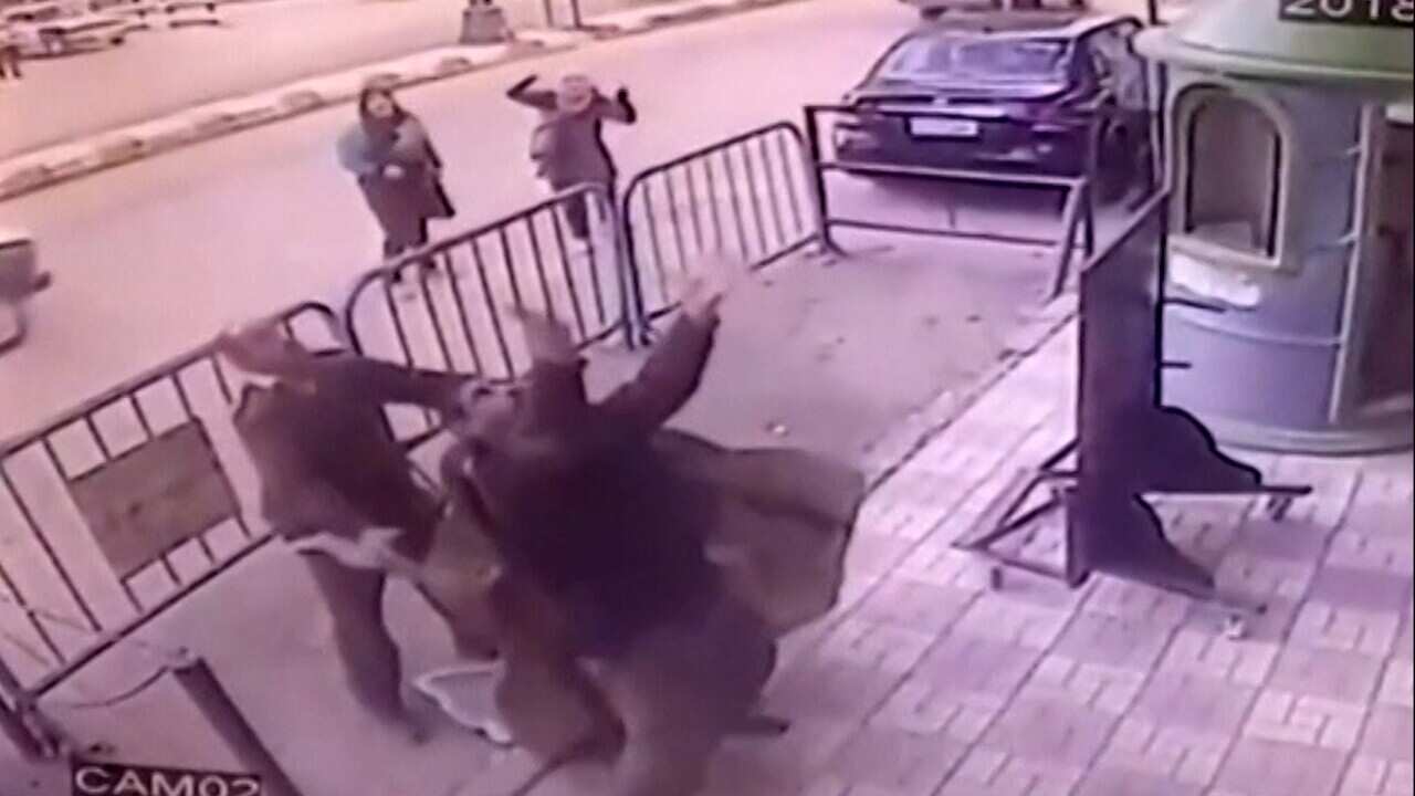 Police in Egypt catch child from third-floor balcony.