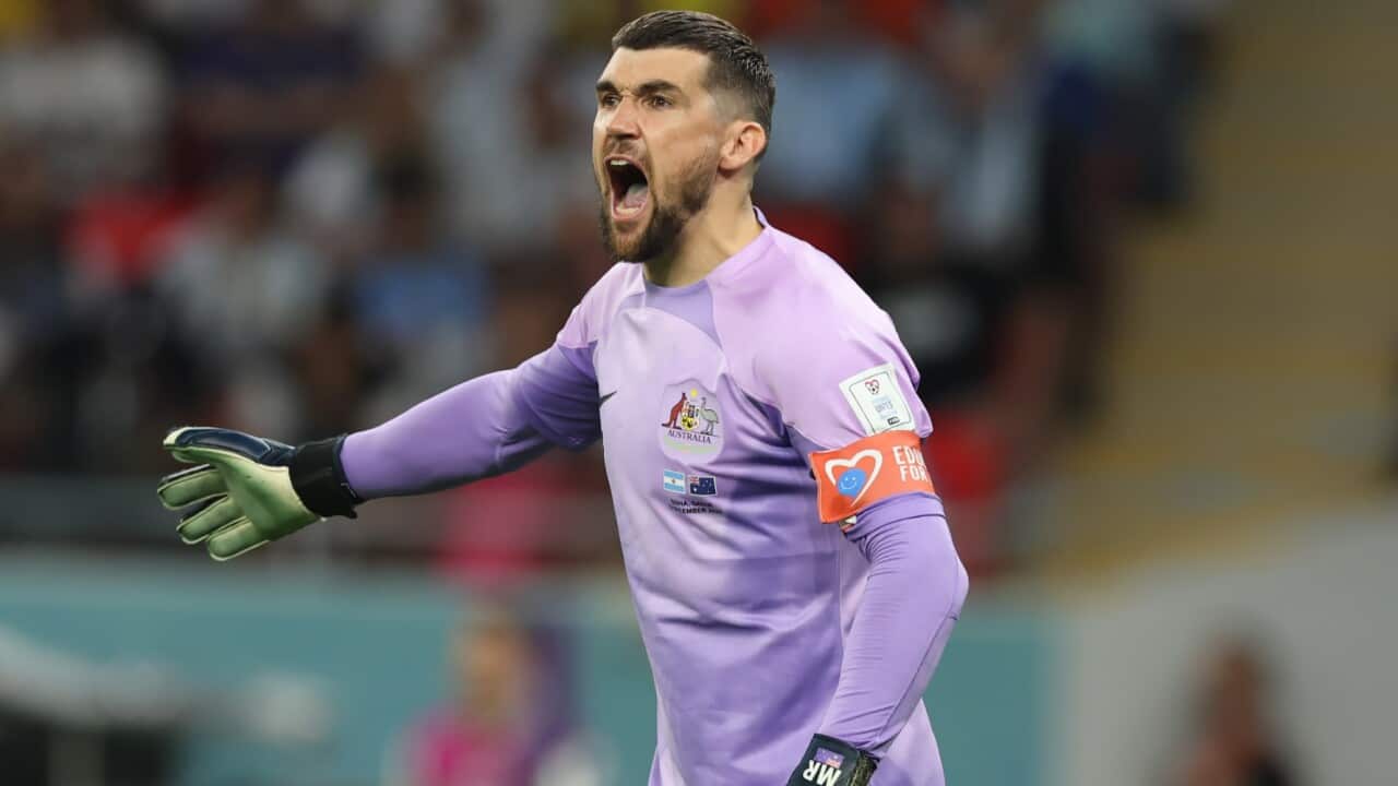 Mat Ryan gestures during a Socceroos match