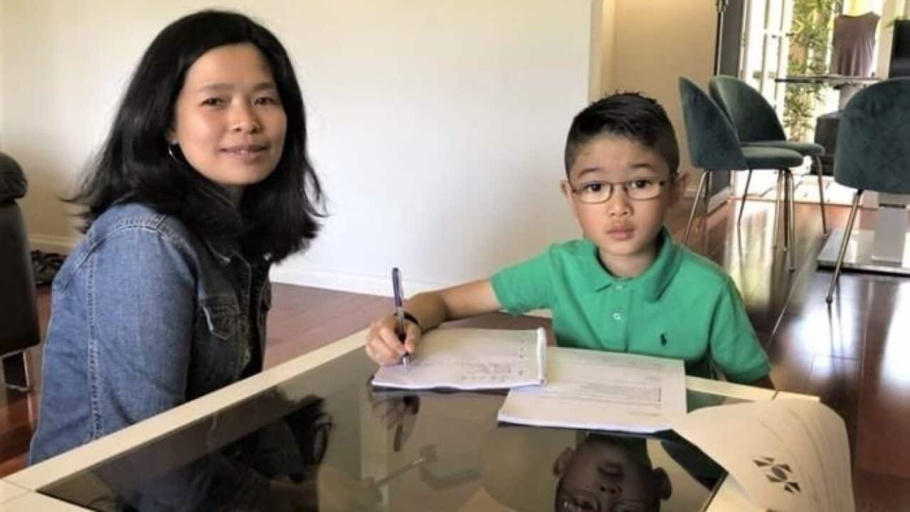 Ethan Chung (right) with his mother Aye Min