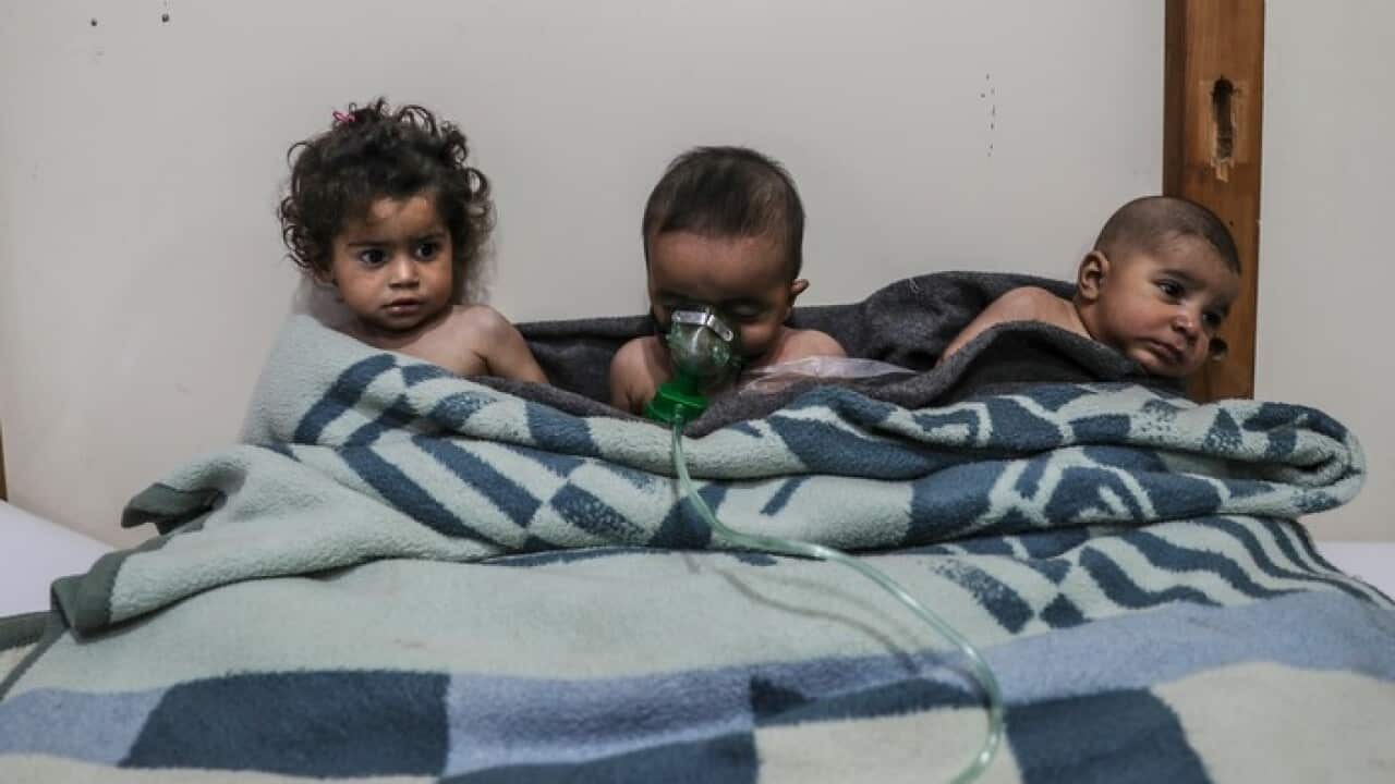 Three children in Eastern Ghouta after a gas attack