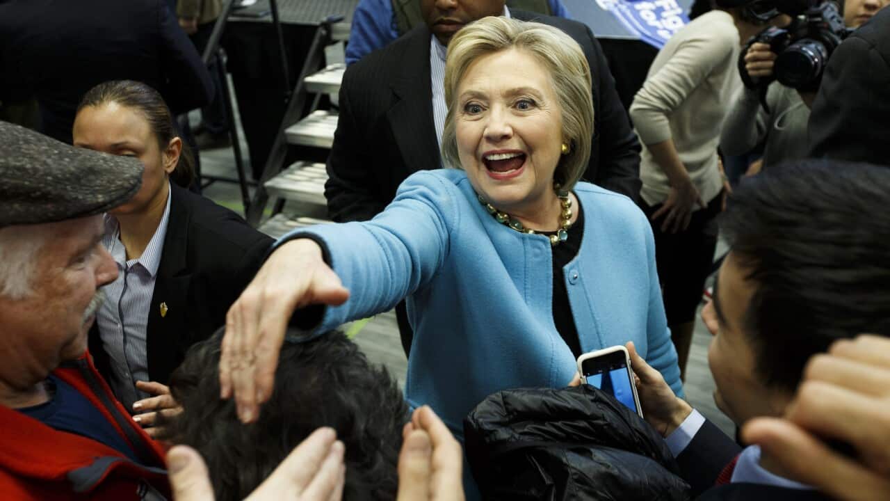 Democratic presidential candidate Hillary Clinton (C) shakes hands with supporters  at a rally at Manchester Community College in Manchester, New Hampshire, USA, on 08 February 2016. 
