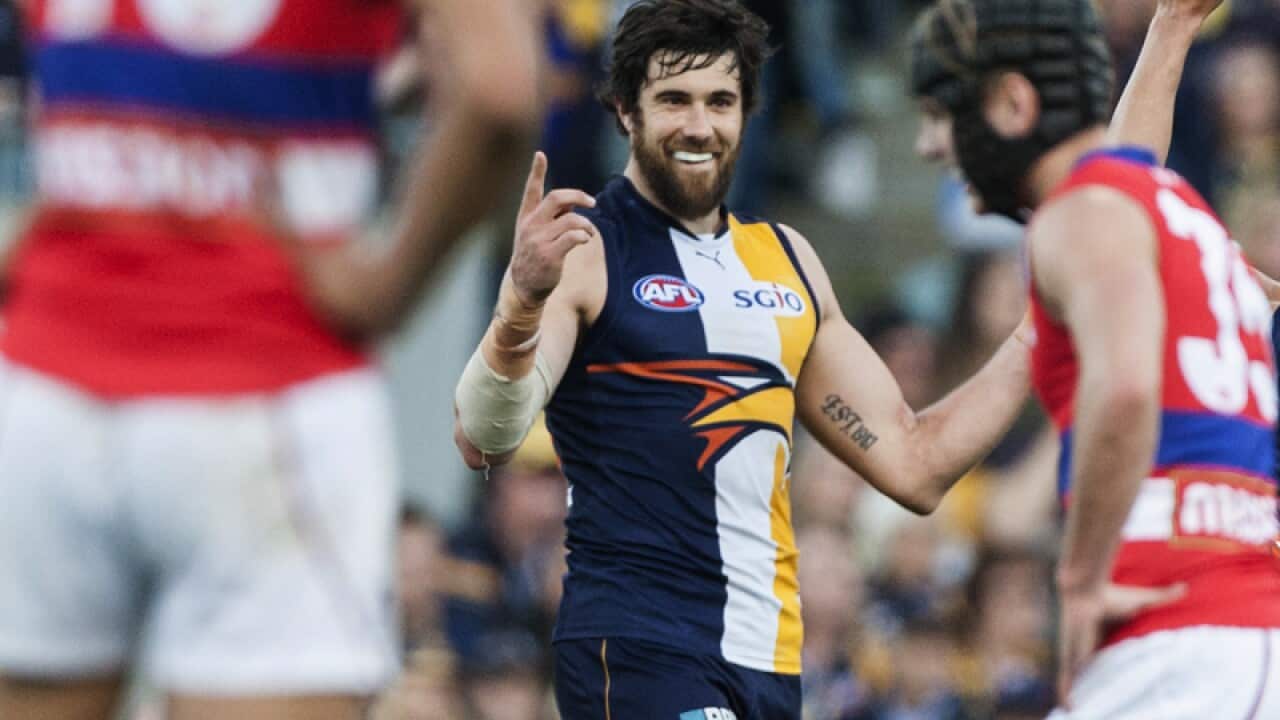 Josh Kennedy of the West Coast Eagles (centre)
