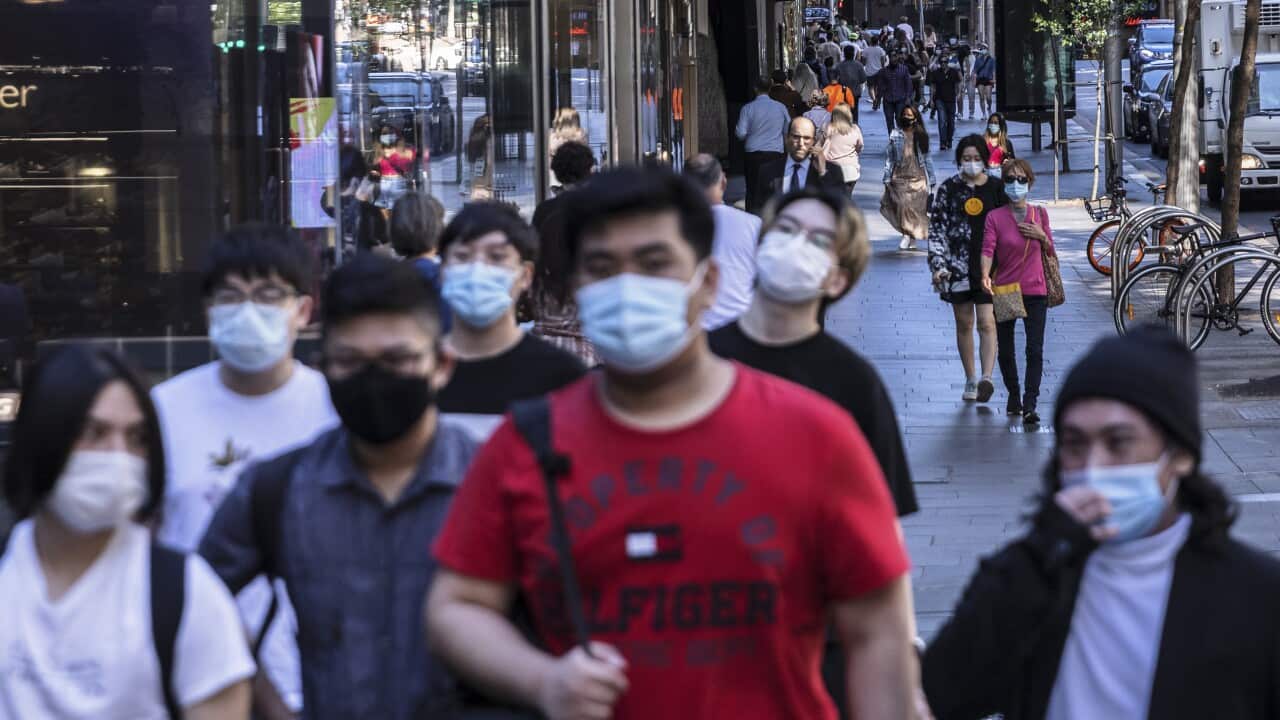 Pedestrians are seen on Market Street on 21 October, 2021 in Sydney, Australia. 