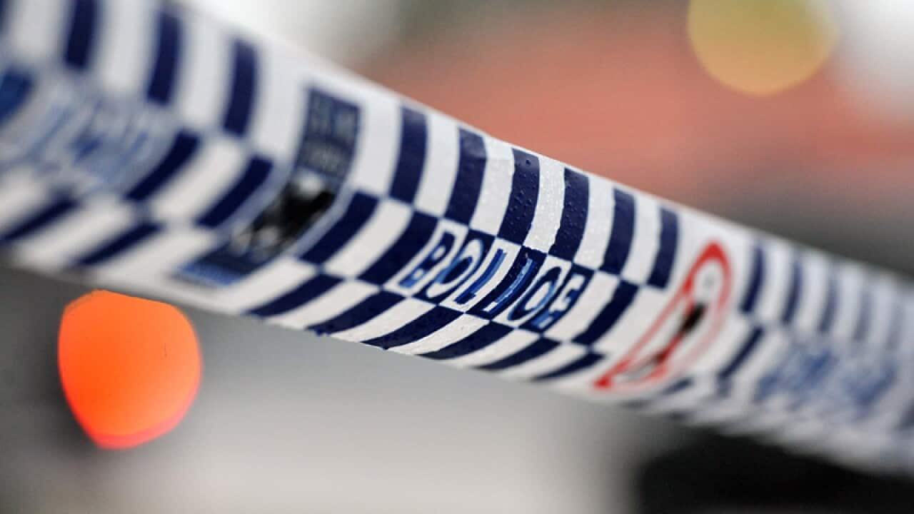 Police tape restricts access to a crime scene north of Sydney