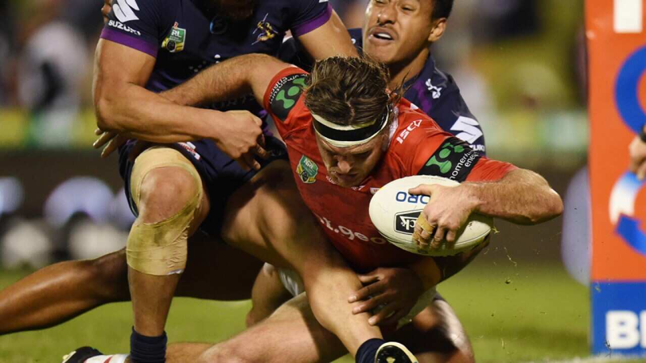 Mitch Rein of the Dragons scores a try