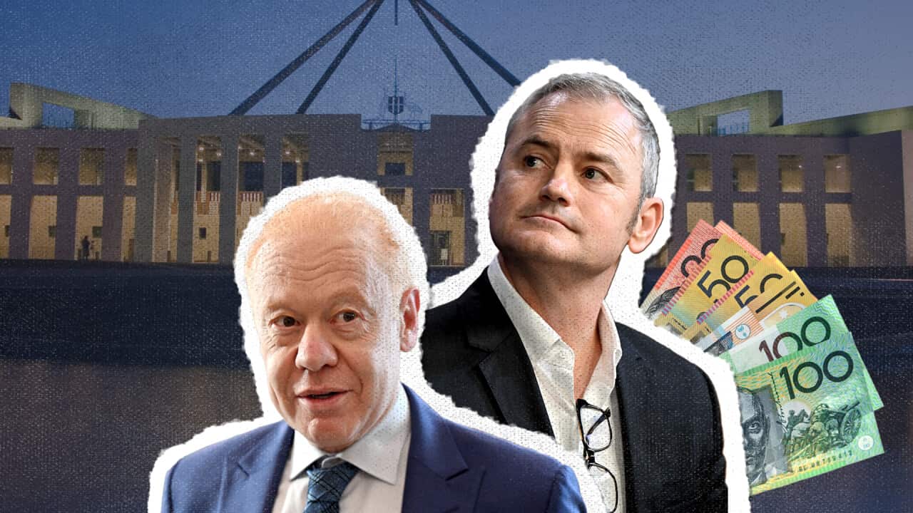 Two men against the backdrop of parliament.