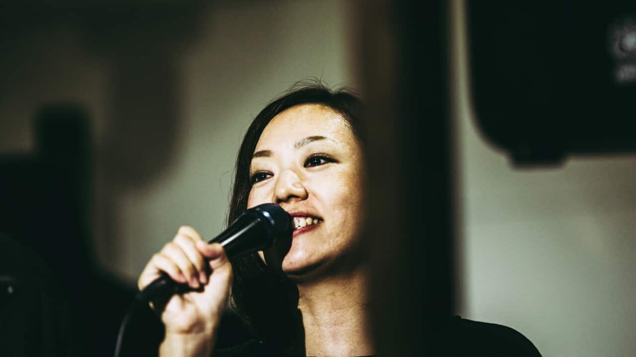 Female singer singing on stage
