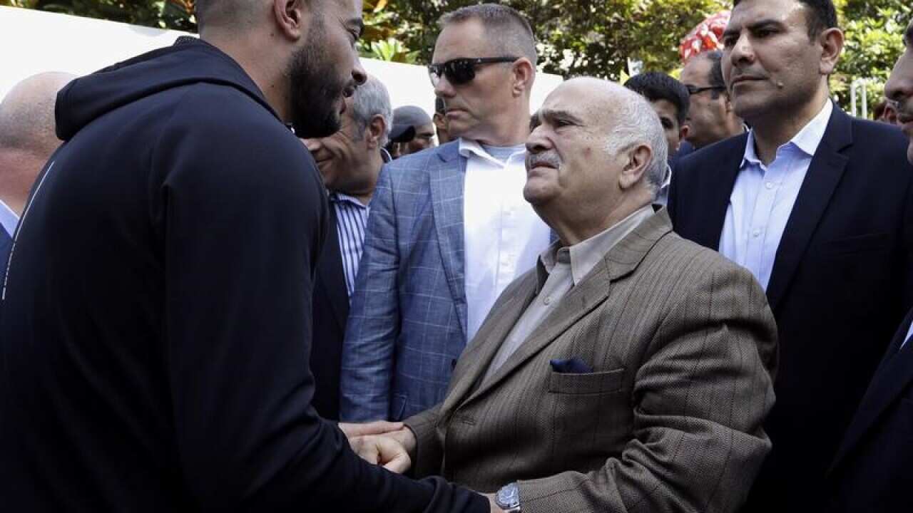 Prince El Hassan bin Talal greets a worshipper in Christchurch.