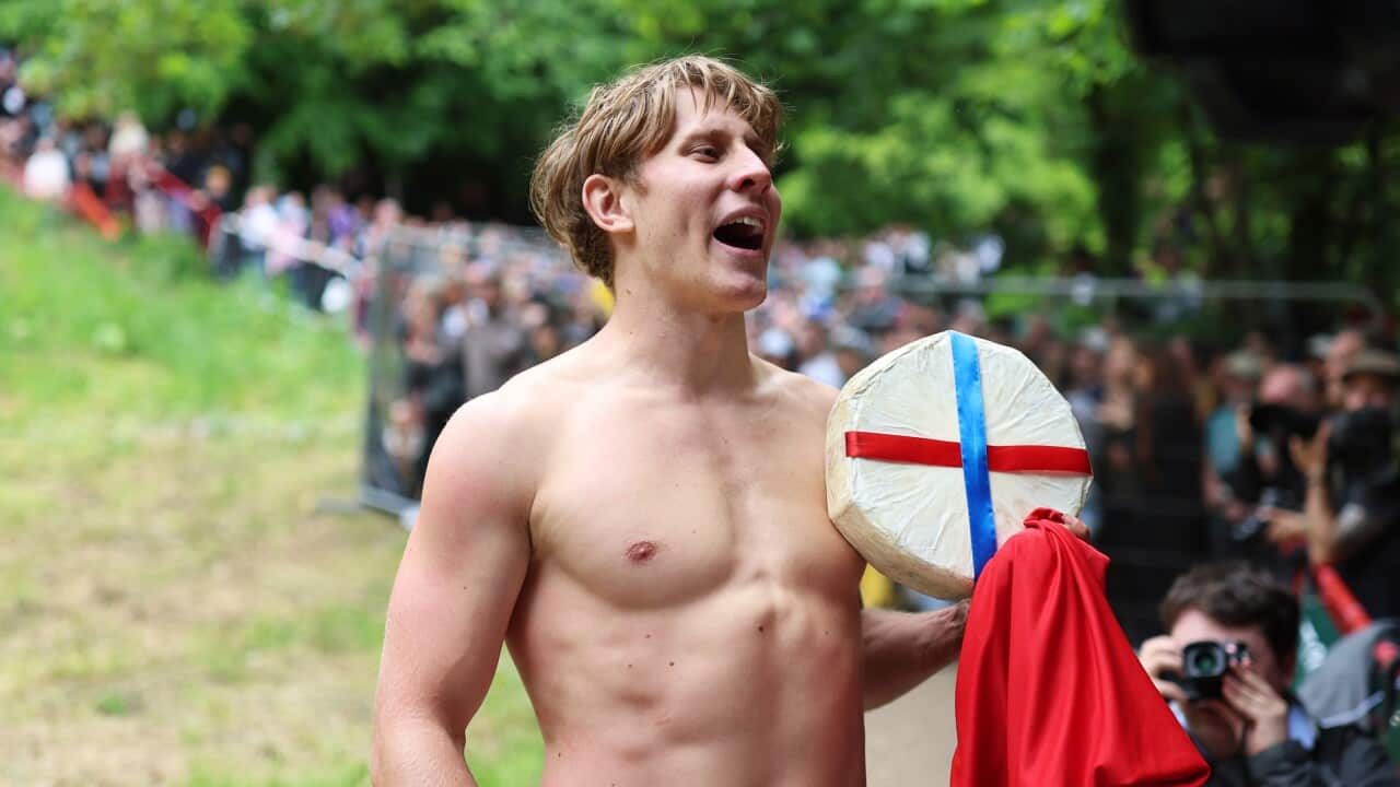 Annual Cooper's Hill Cheese-Rolling Event Takes Place In Gloucester