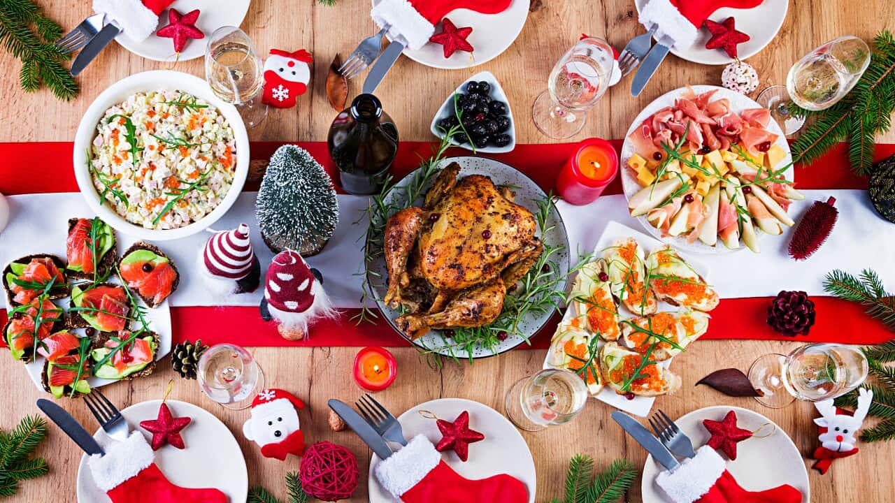baked-turkey-christmas-dinner-christmas-table-is-served-with-turkey-decorated-with-bright-tinsel-candles-fried-chicken-table-family-dinner-top-view-flat-lay-overhead-copy-space.jpg