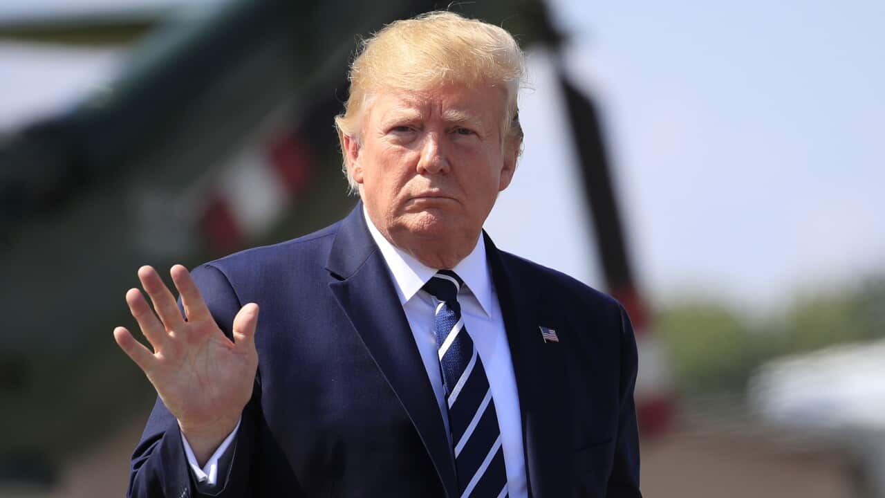 President Donald Trump walks on the tarmac to board Air Force One at Morristown Municipal Airport, in Morristown, N.J., on his way returning back to the White House Sunday, July 21, 2019. (AP Photo/Manuel Balce Ceneta)