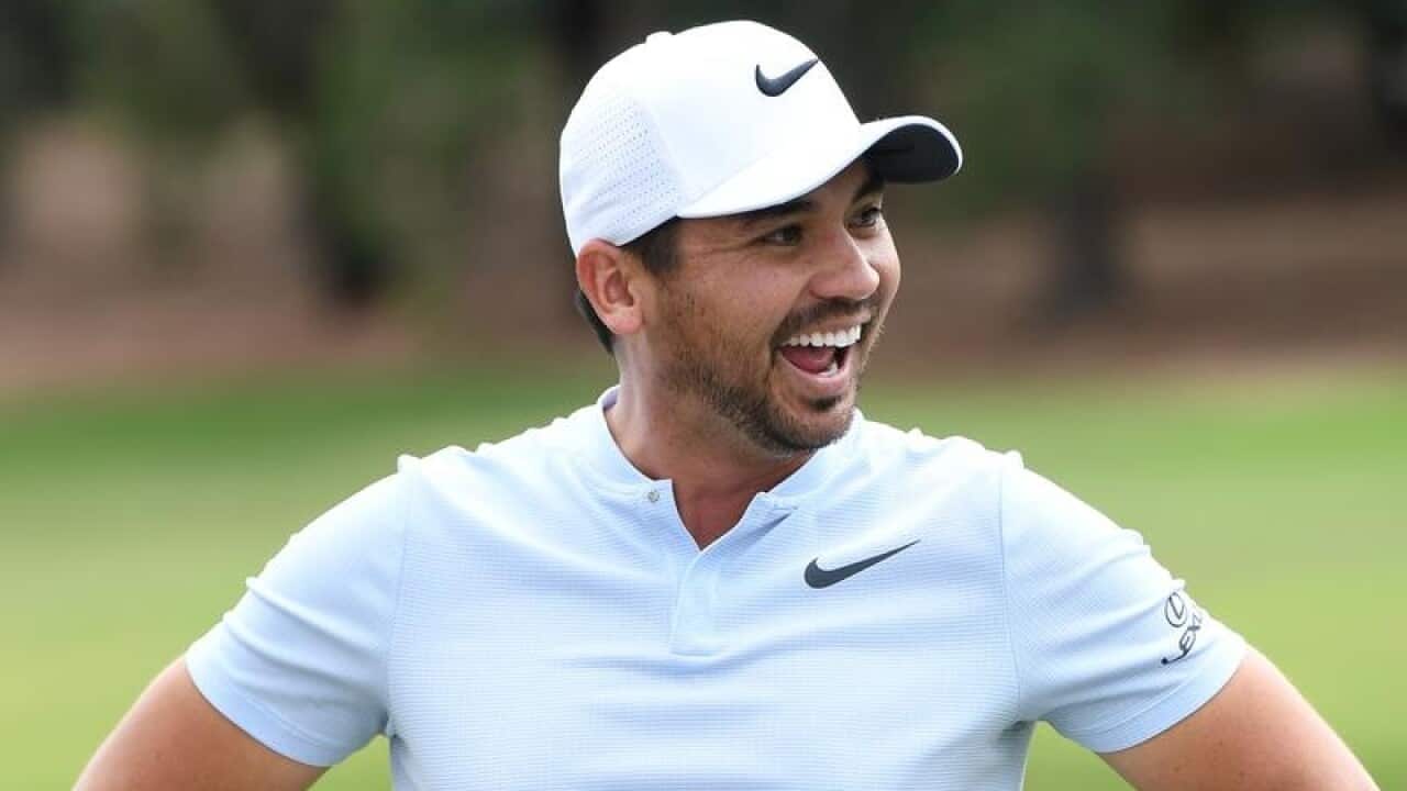 Jason Day at a kids' golf clinic.