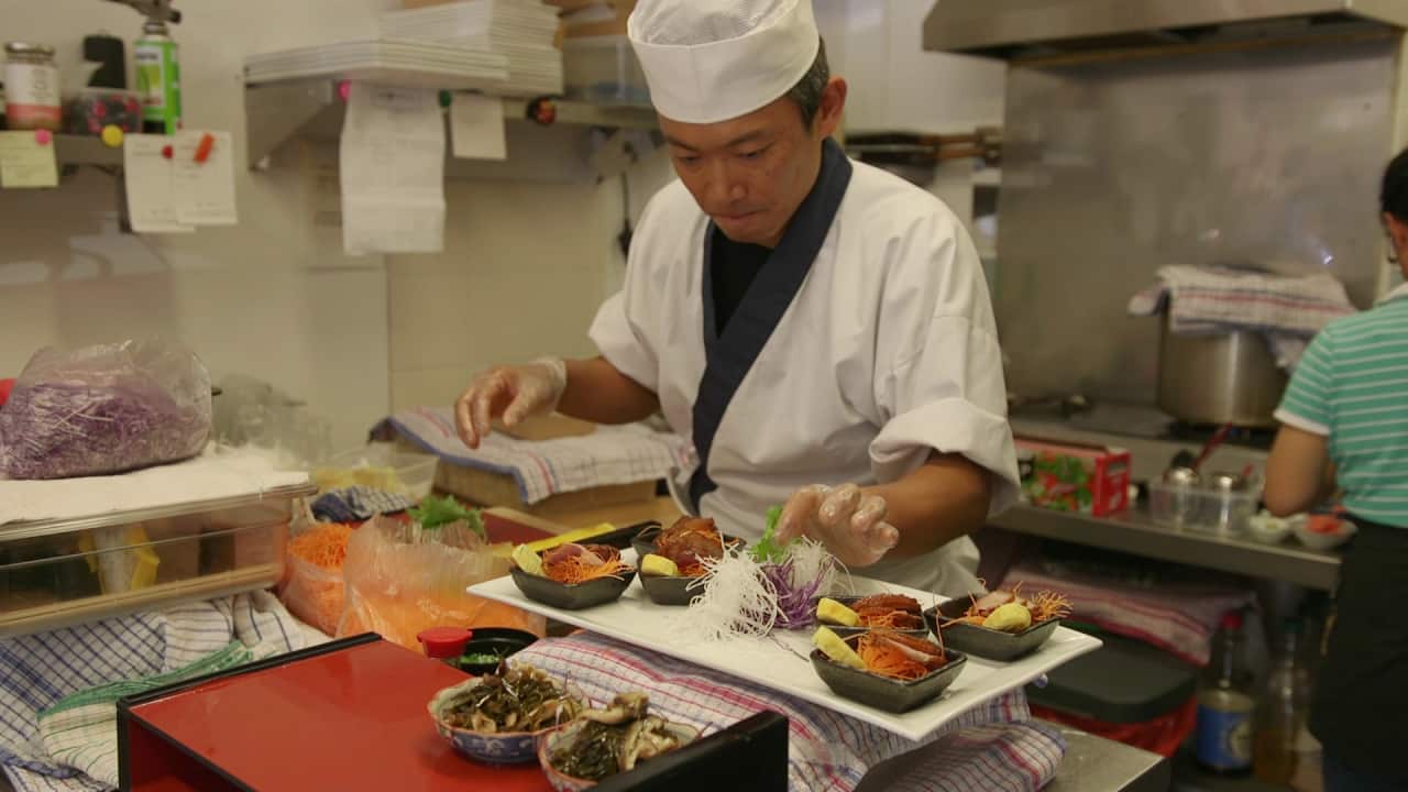 People are lining up for Masaaki Koyama's sushi at his store in Geeveston, Tasmania. 