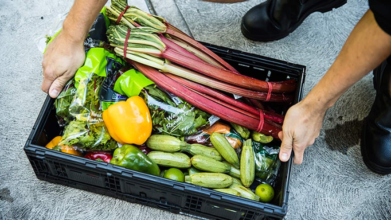 Fresh produce is rescued and shared by OzHarvest.