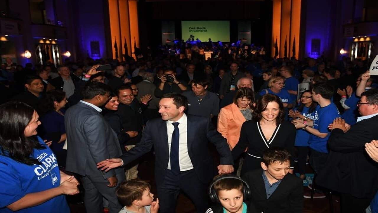 Matthew Guy with his family