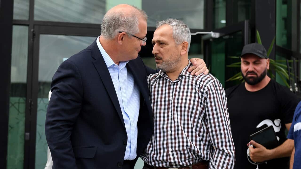 Prime Minister Scott Morrison embraces Jamal Rifi after meeting with Imams and Islamic community leaders during a visit to the Lakemba Mosque, at Lakemba.