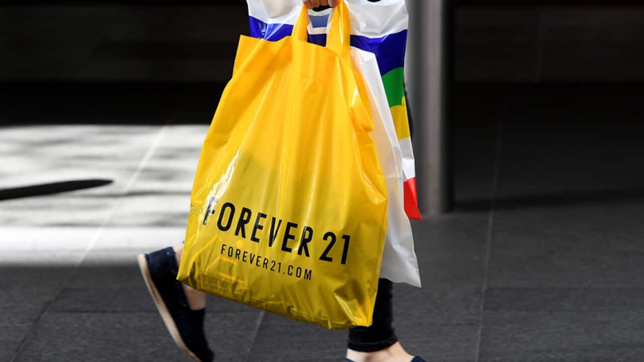 Shoppers are seen in Pitt Street Mall in Sydney