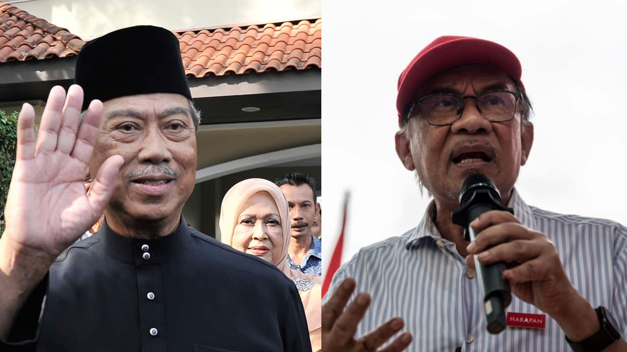 Former Malaysian premier Muhyiddin Yassin and veteran opposition leader Anwar Ibrahim