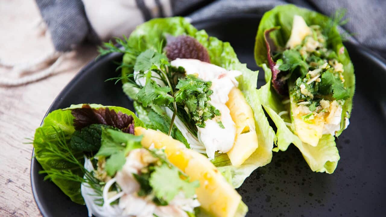 Salt-crusted baked fish (Pla pao)