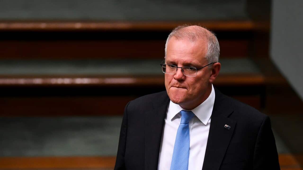 Australian Prime Minister Scott Morrison reacts during House of Representatives Question Time at Parliament House in Canberra, Tuesday, March 16, 2021. (AAP Image/Lukas Coch) NO ARCHIVING