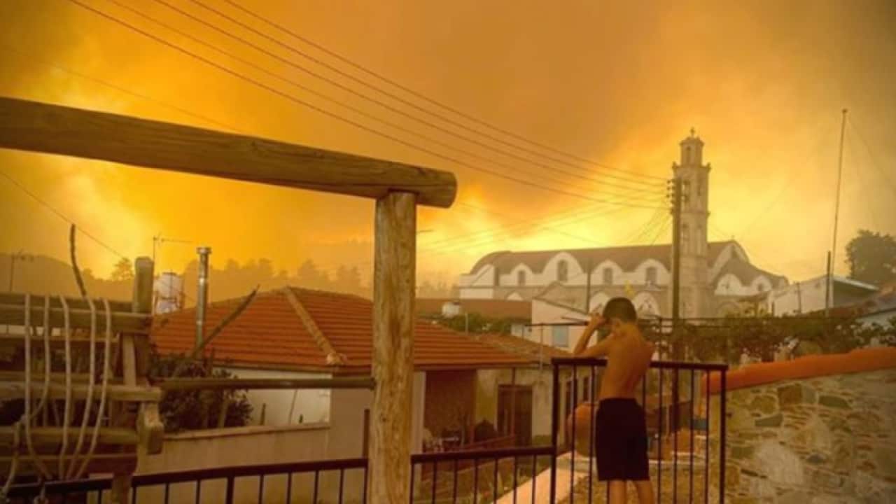child in fire-ravaged Cyprus village