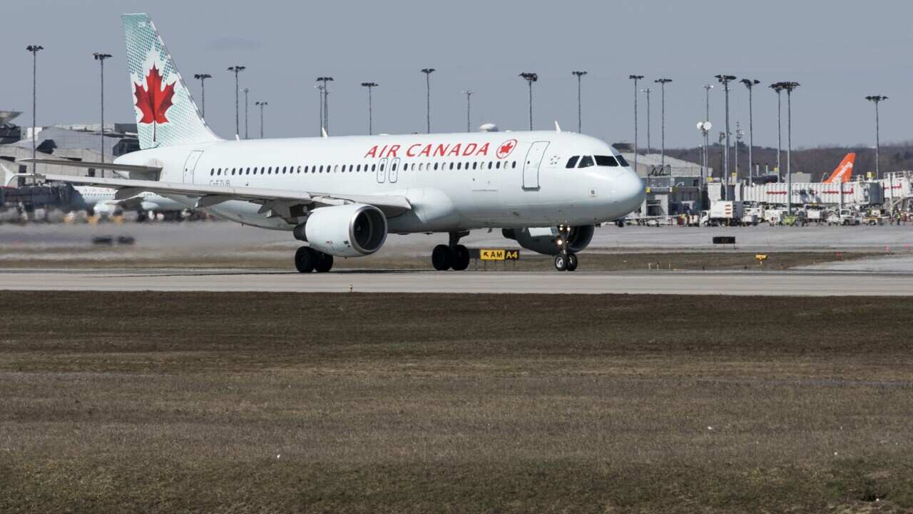 A Air Canada Airbus A320 airplane is seen departing Montral-Pierre Elliott Trudeau International Airport in Montreal, Quebec, Canada