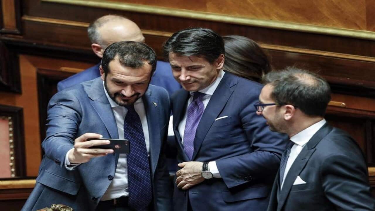 Italian senators pose with Prime MInister Giuseppe Conte.