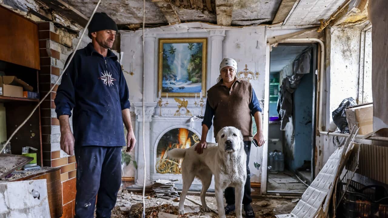 Sergiy and Lina present her destroyed living room at the recaptured village of Osokorivka, Ukraine, 25 October 2022. The village was liberated by Ukrainian forces in the beginning of April but since then it is still under ongoing fire of Russian army.