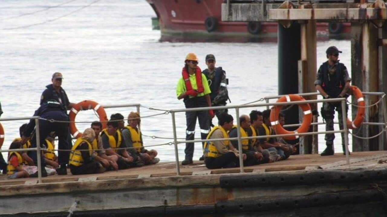 A boat carrying asylum seekers arrives at Christmas Island
