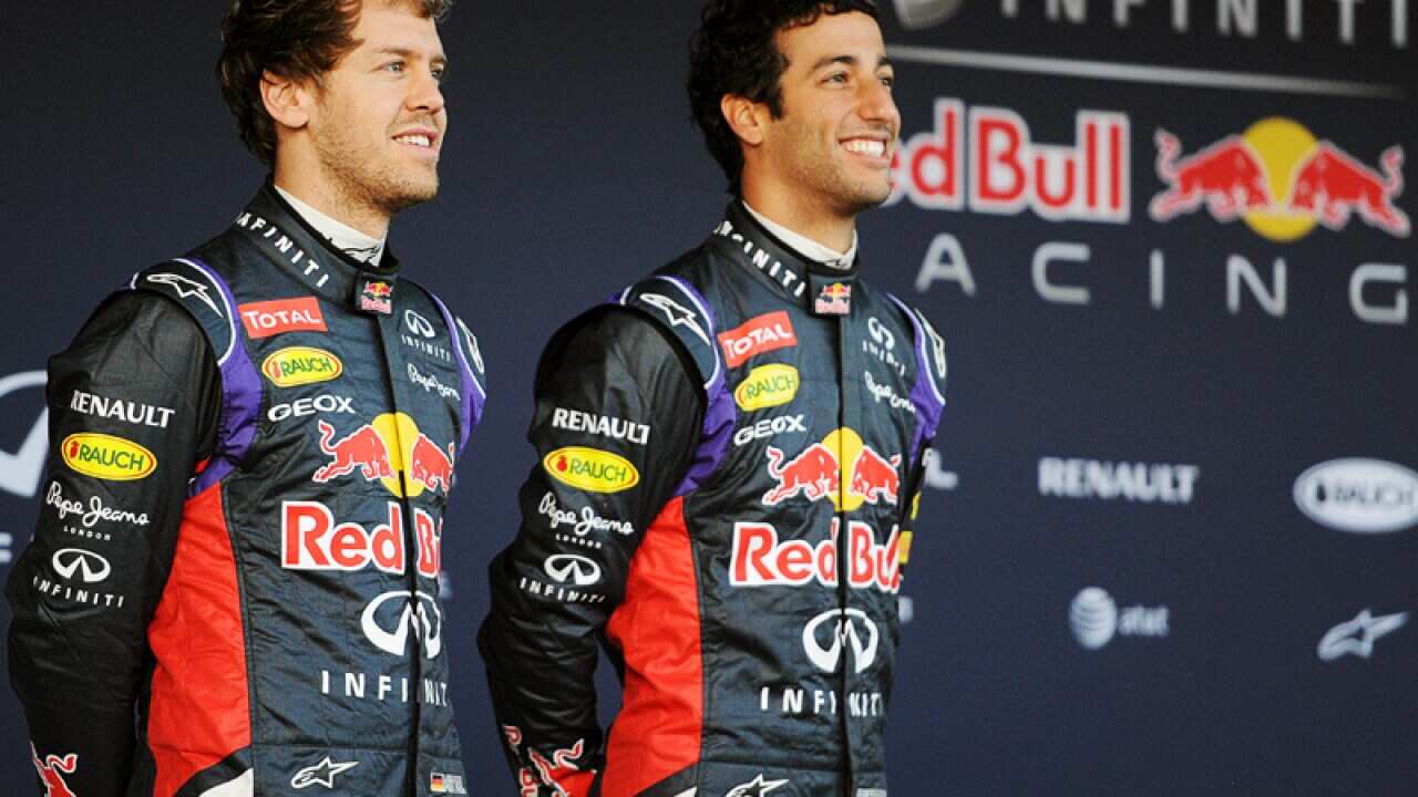 Formula One driver's Sebastian Vettel (L) and Daniel Ricciardo