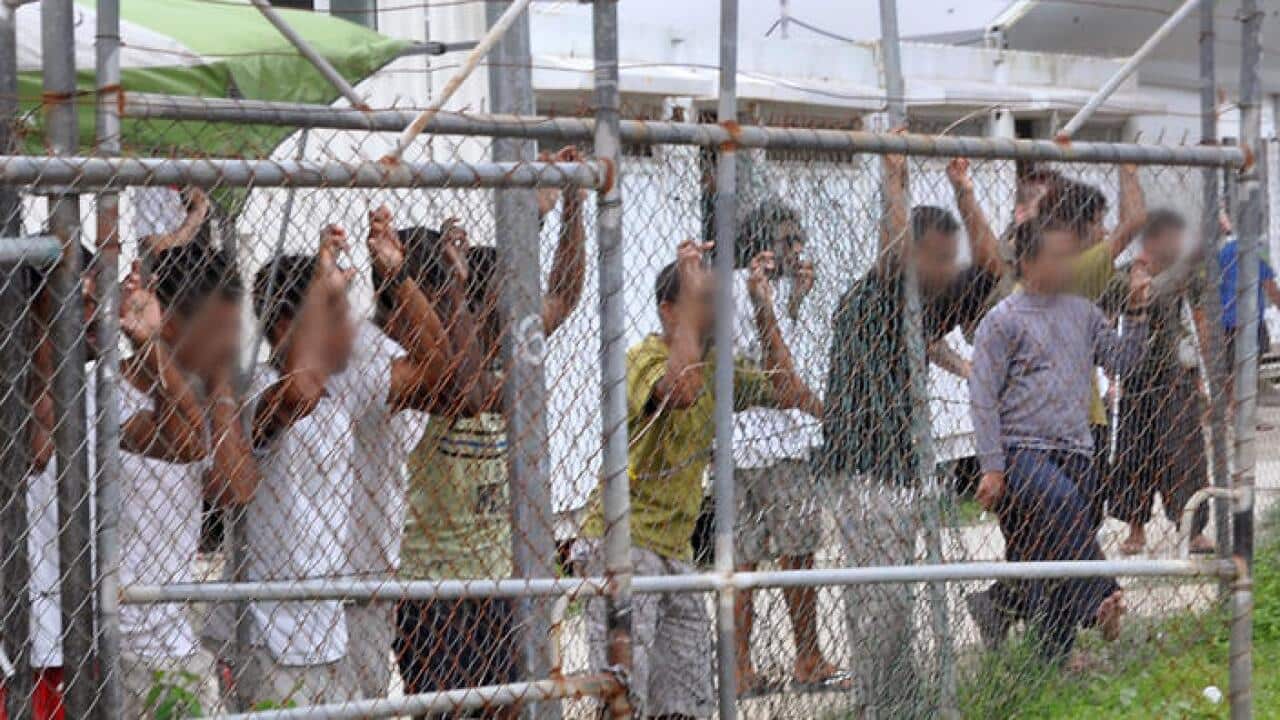 File image of refugees and asylum seekers in the Manus Island immigration detention centre.