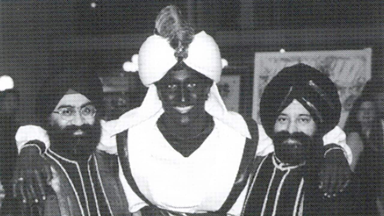 A photo shows a costumed Prime Minister Justin Trudeau, his face and hands darkened by makeup, attending a "Arabian Nights" gala