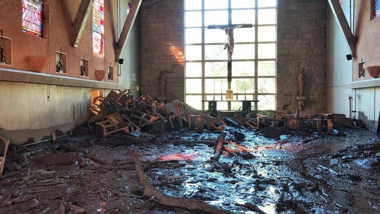 A home filled with mud and debris in the southern California mudslides