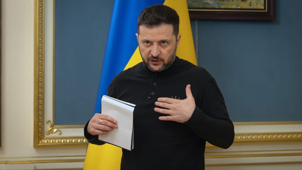 Ukrainian President Volodymyr Zelenskyy speaks during a briefing in Kyiv