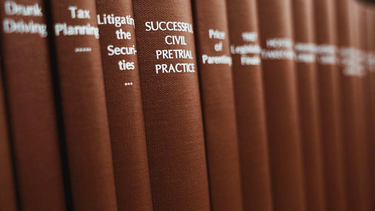 Legal books lined up at a law library
