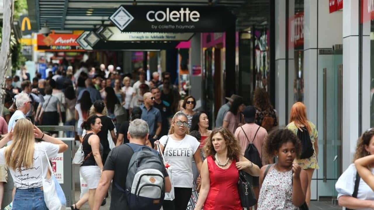 Shoppers are seen in the Queen Street Mall