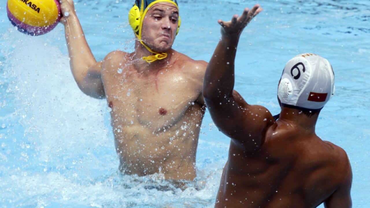 Aust men win first world water polo game