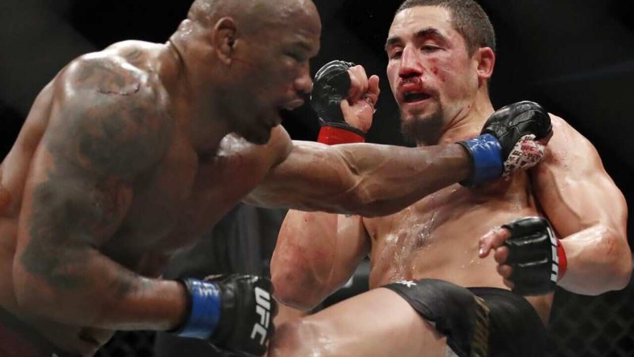 Robert Whittaker and Yoel Romero fight