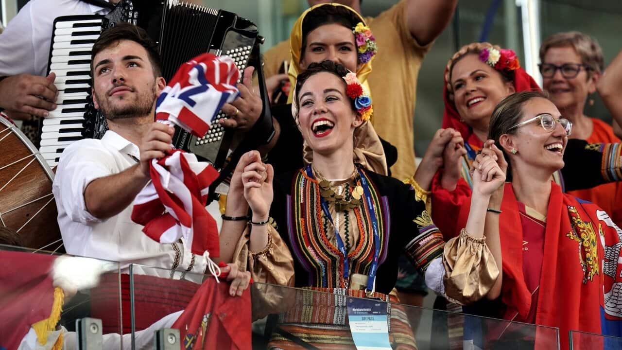 Serbian fans are seen during the Novak Djokovic singles match against Cristian Garin of Chile on day 6 of the ATP Cup tennis tournament at Pat Rafter Arena in Brisbane, Wednesday, January 8, 2020. (AAP Image/Dave Hunt) NO ARCHIVING, EDITORIAL USE ONLY