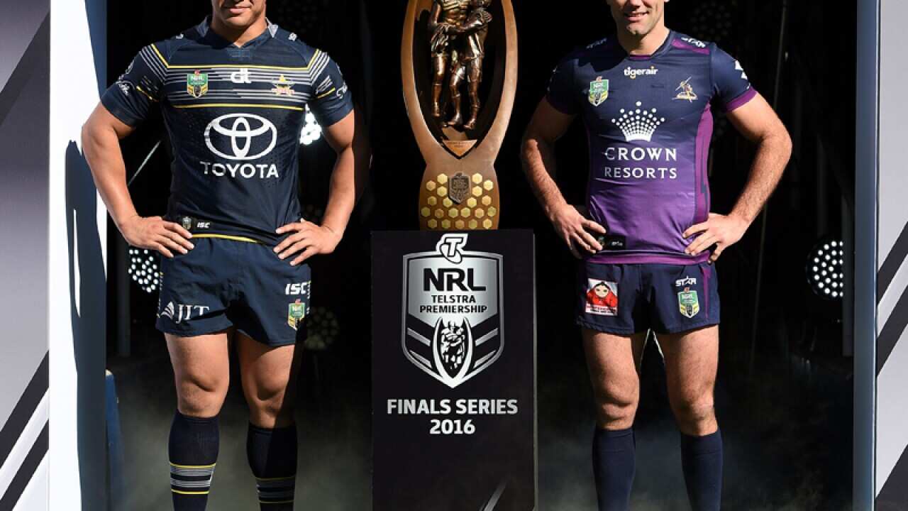 Jason Taumalolo of the Cowboys and Cameron Smith of the Storm