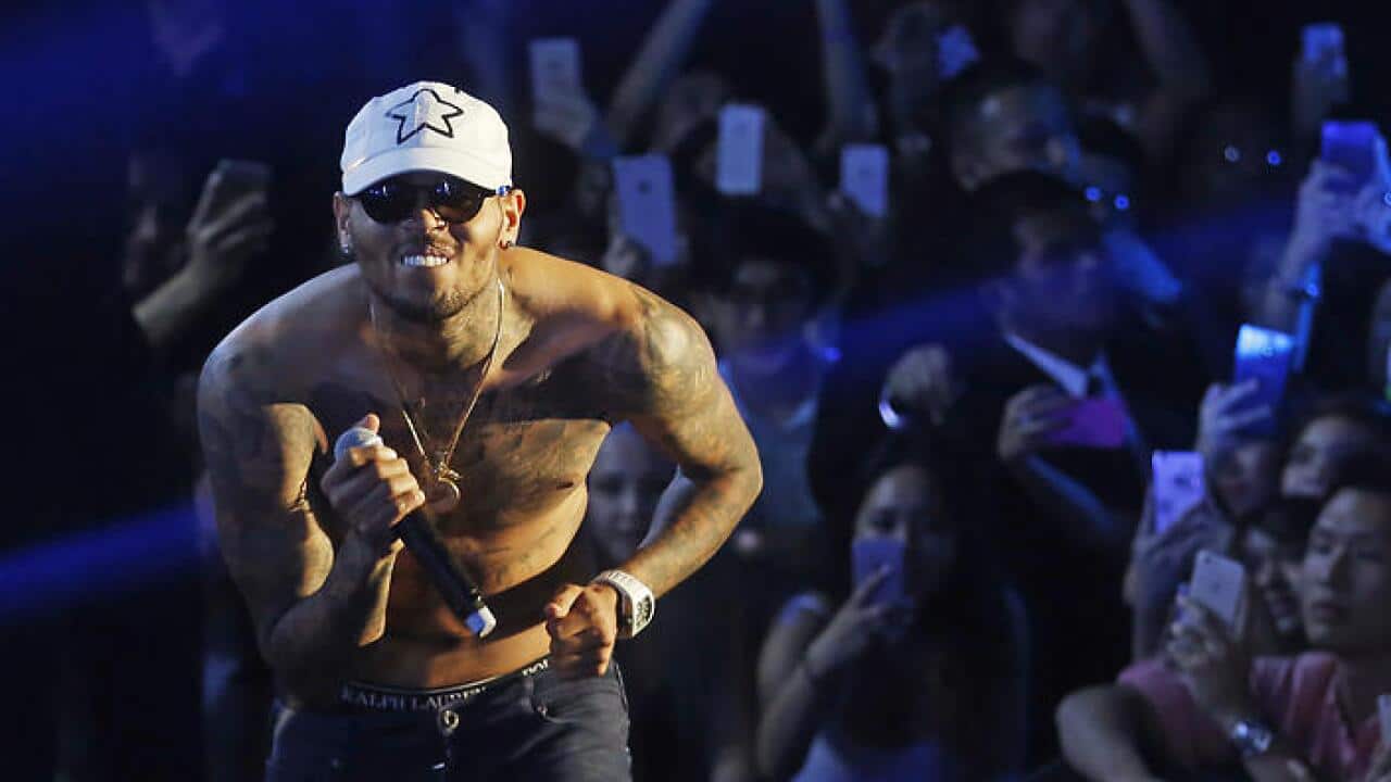 Singer Chris Brown will be denied entry into Australia due to his 2009 assault on partner Rihanna. (AAP)