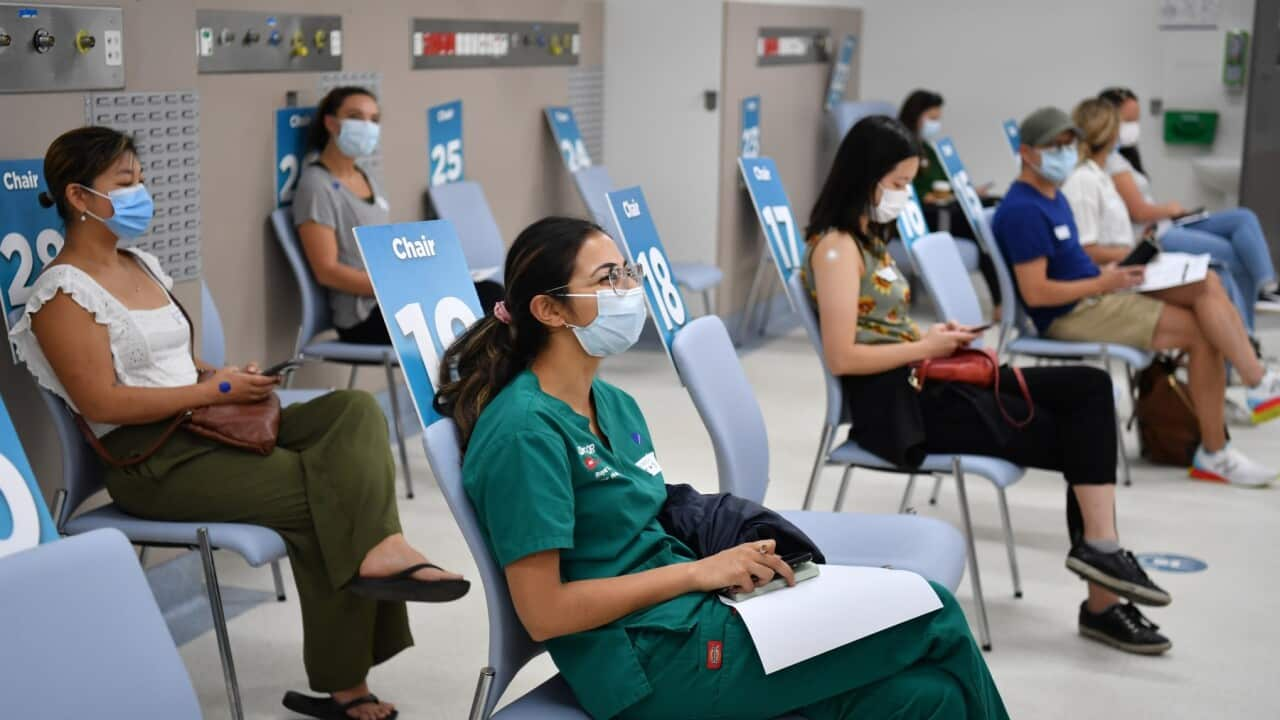 Health care workers wait in observation after receiving their COVID-19 vaccinations at the Westmead Hospital Vaccination Hub on March 1, 2021 in Sydney. 