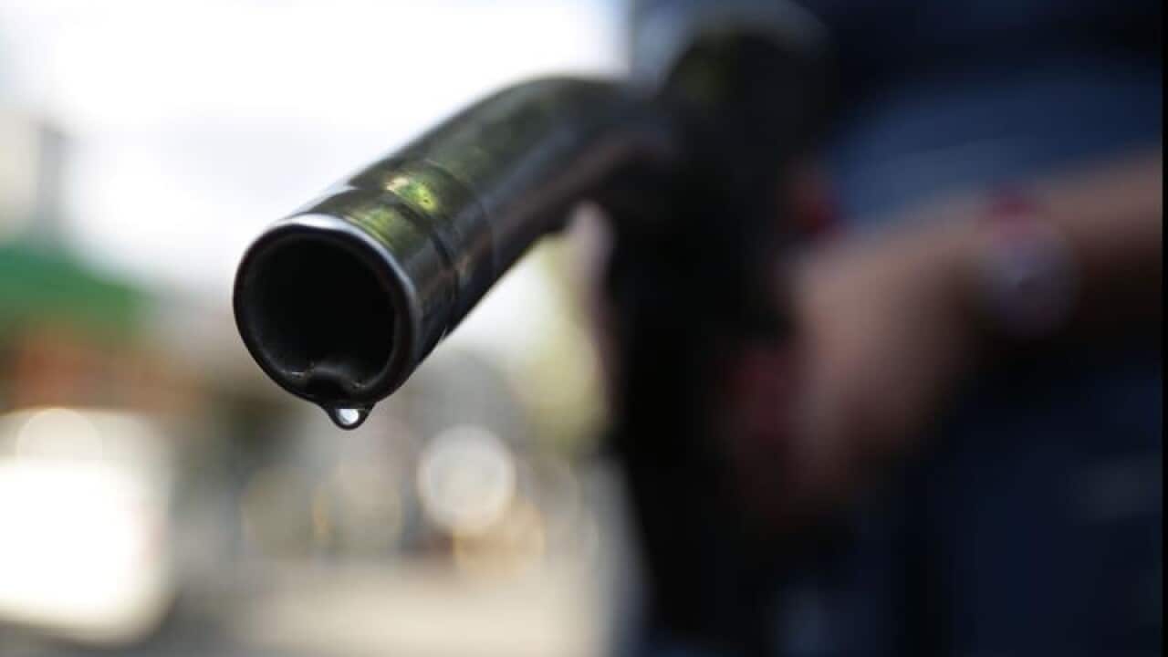 A car being filled up at a petrol station