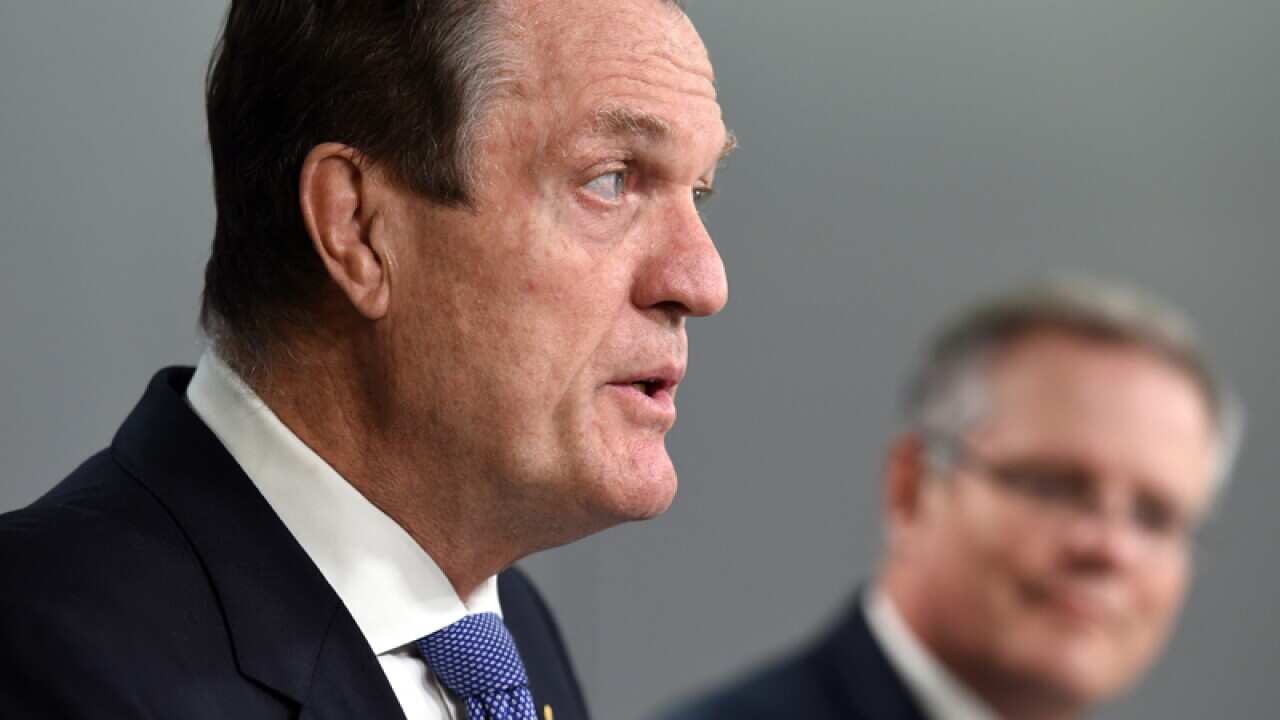 Tax Commissioner Chris Jordan (L) with Treasurer Scott Morrison