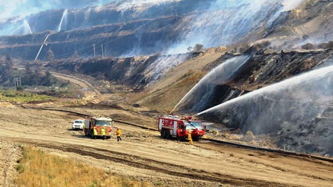 Firefighters battling the blaze at the Hazelwood open cut coal mine - AAP-1.jpg