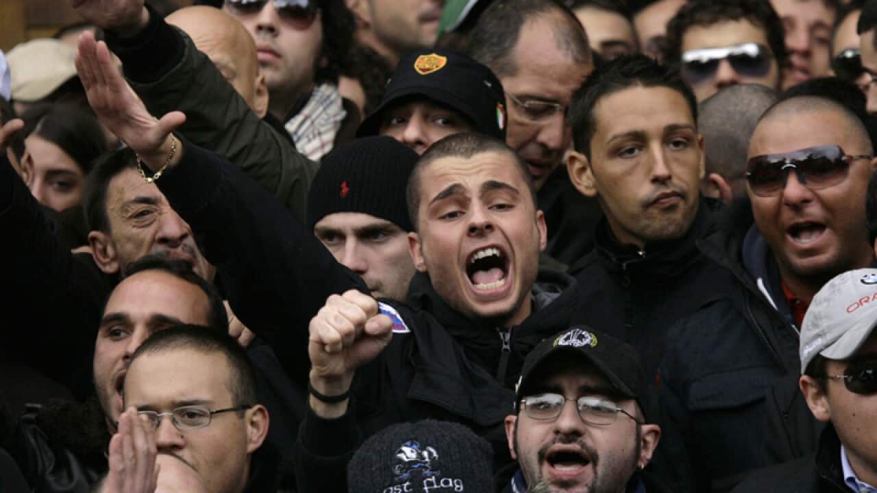 Soccer fans give the fascist salute in Rome