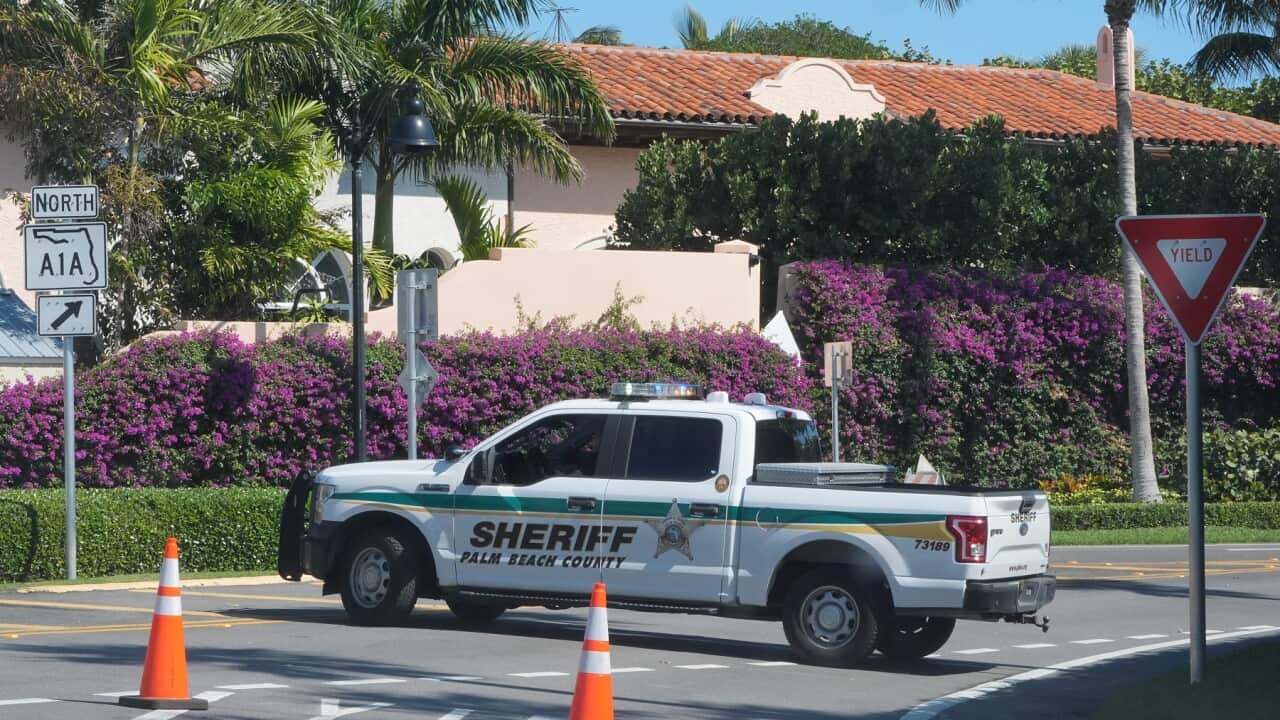 A Palm Beach County Sheriff vehicle blocks traffic near Mar-a-Lago (AAP)